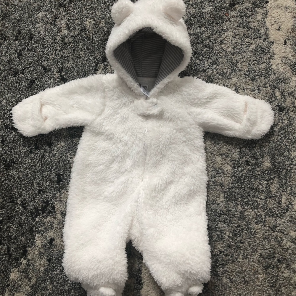 White Sherpa like bodysuit.